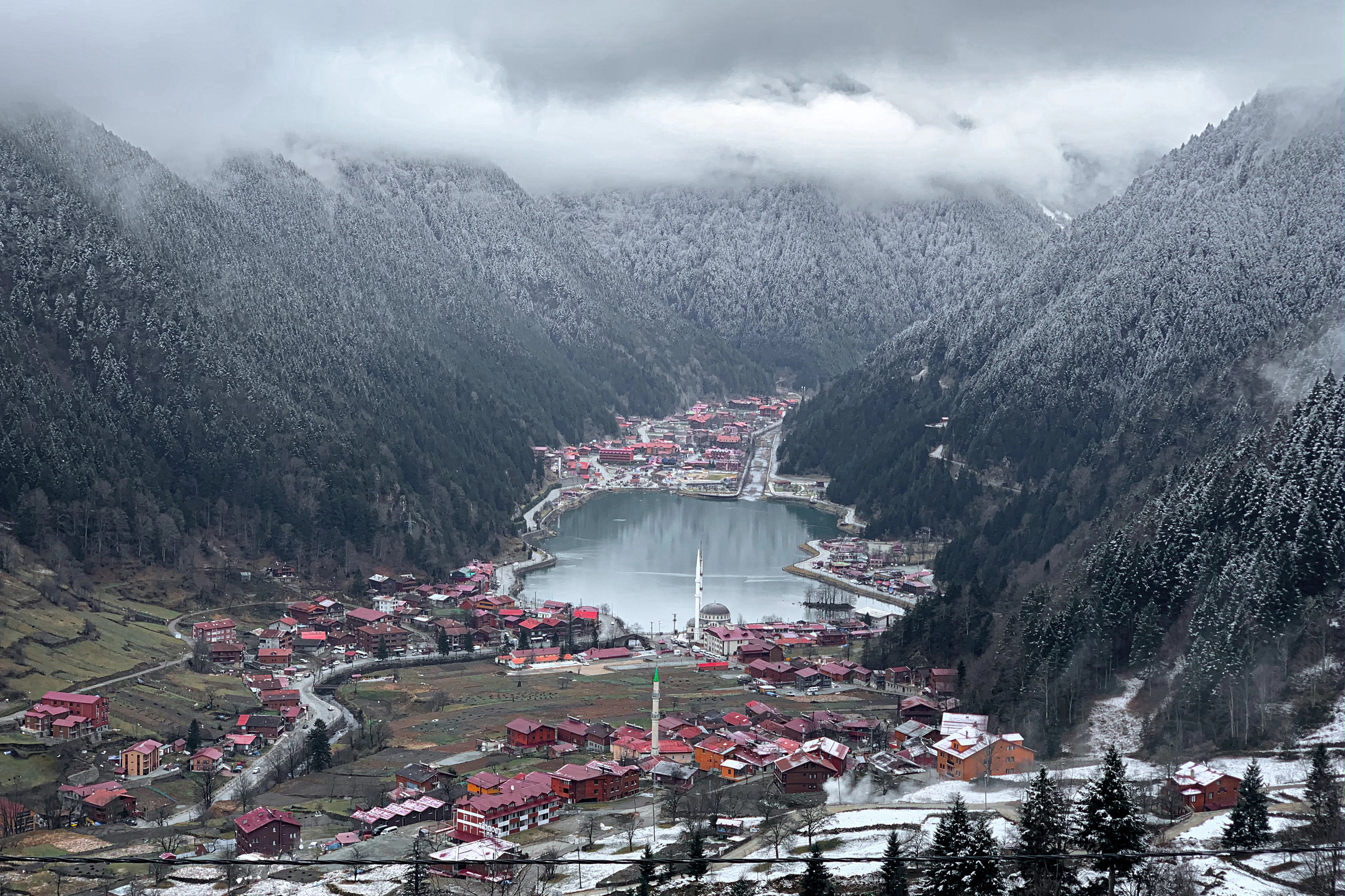 aerial view of city near mountain during daytime