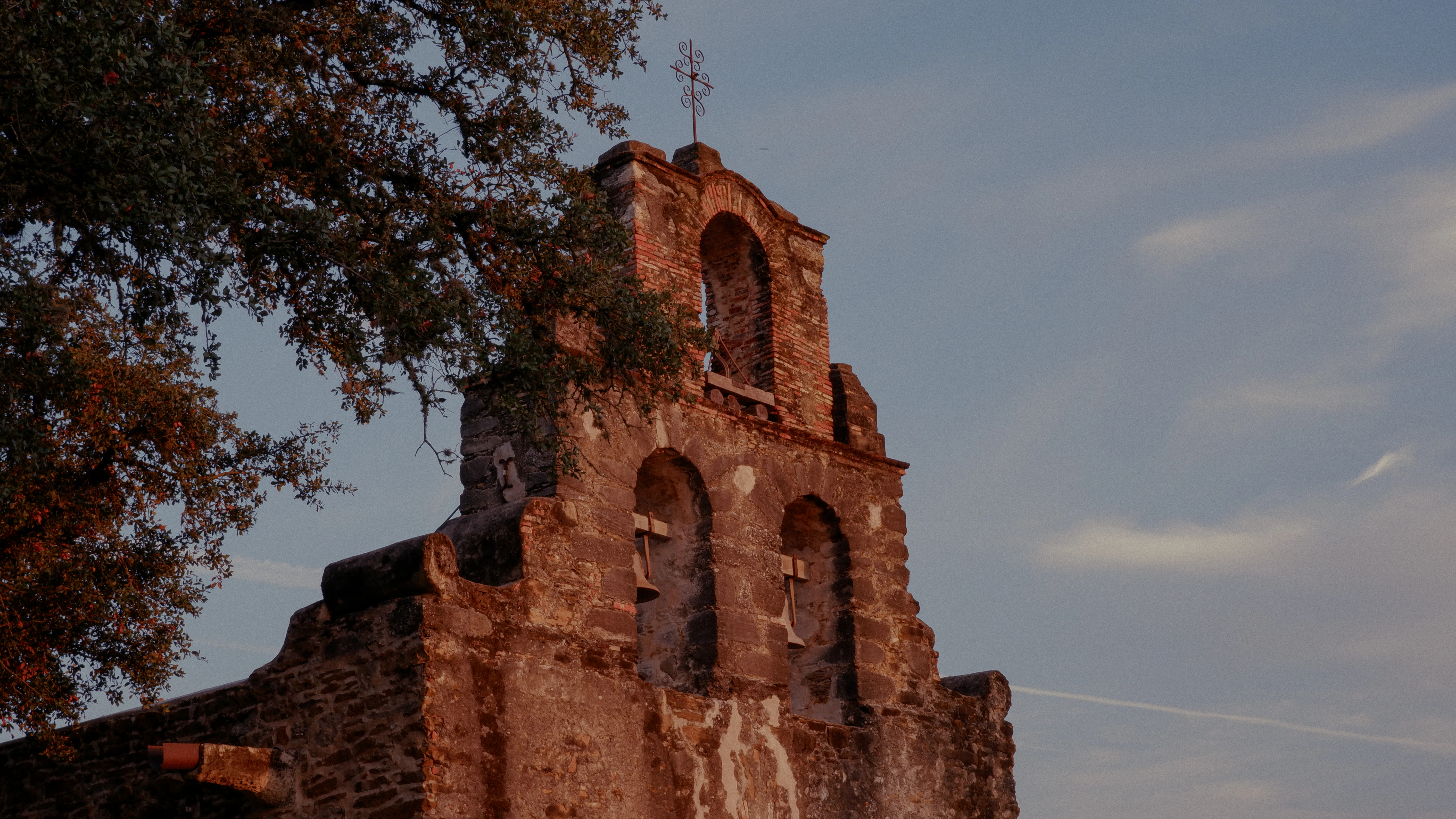 a tall tower with a clock on the top of it