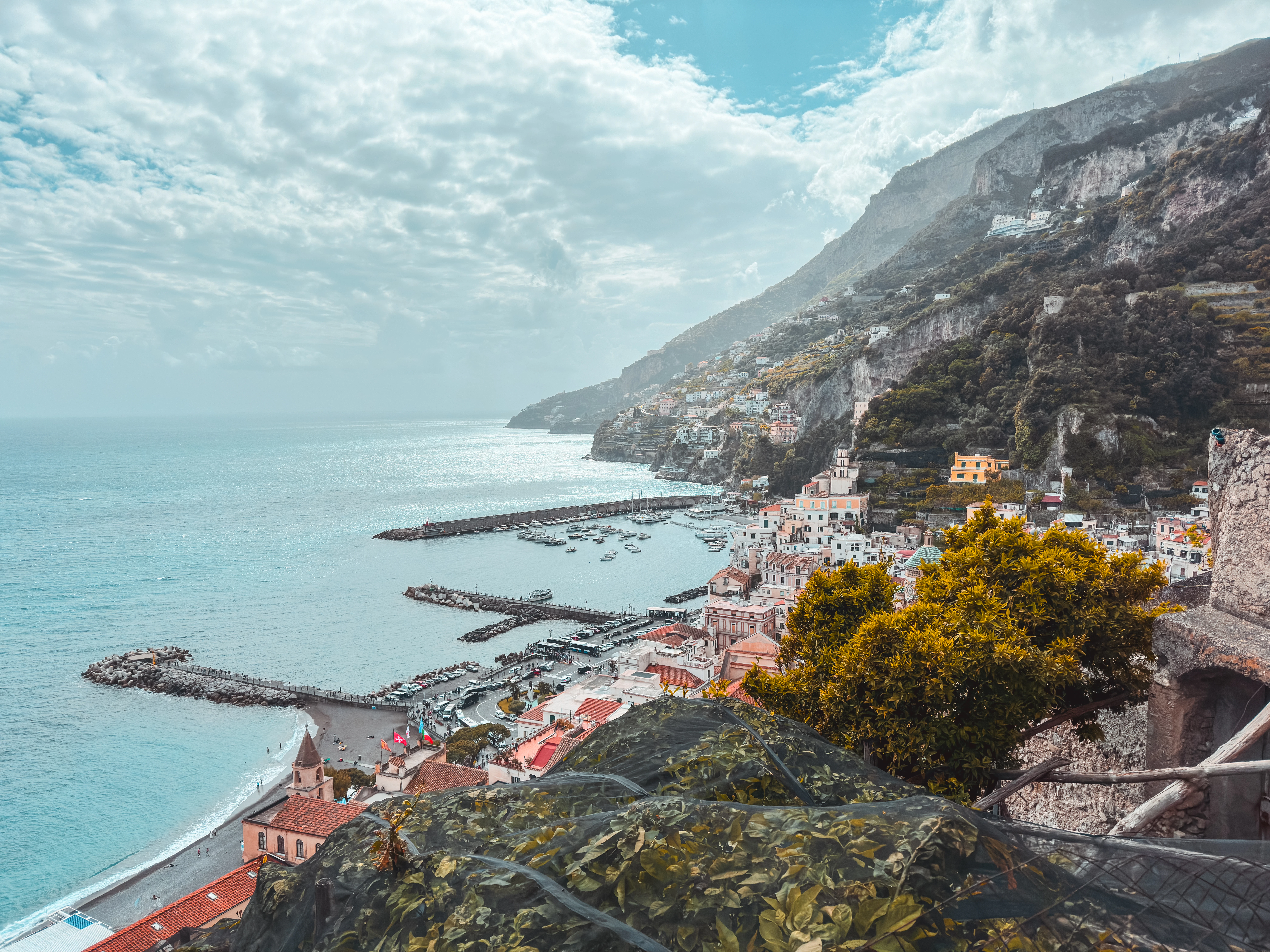 A scenic view of the ocean from a hill