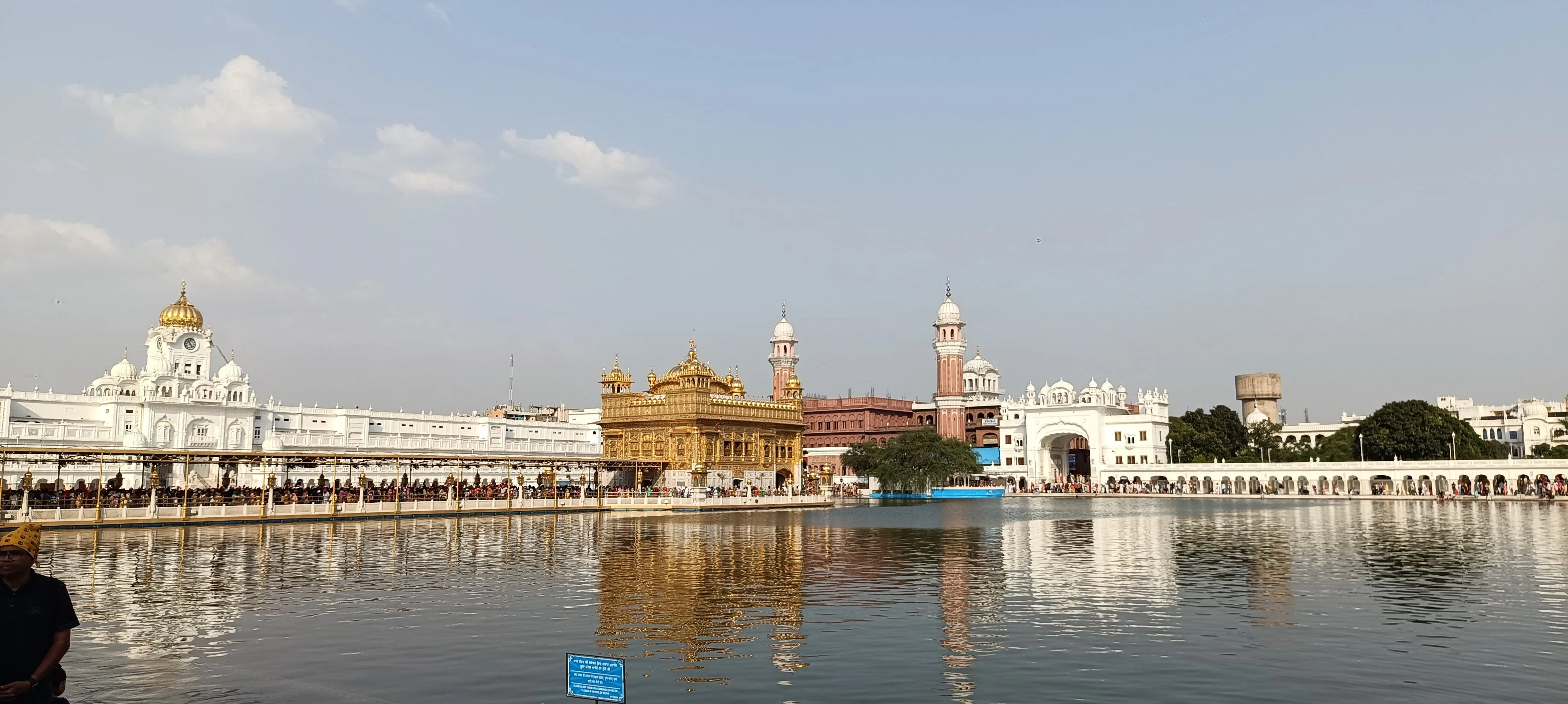 a body of water with buildings in the background
