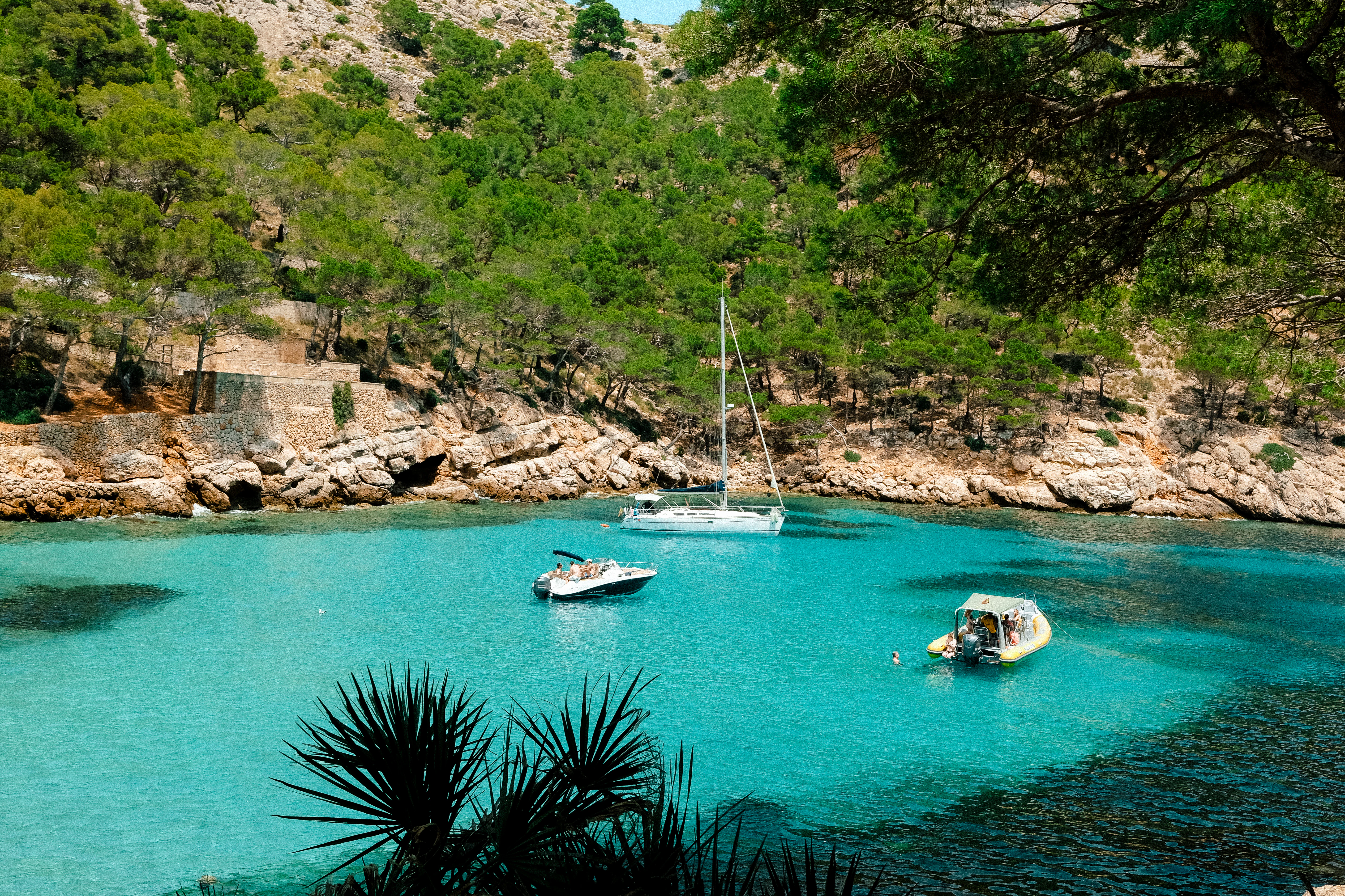 a body of water with boats floating in it