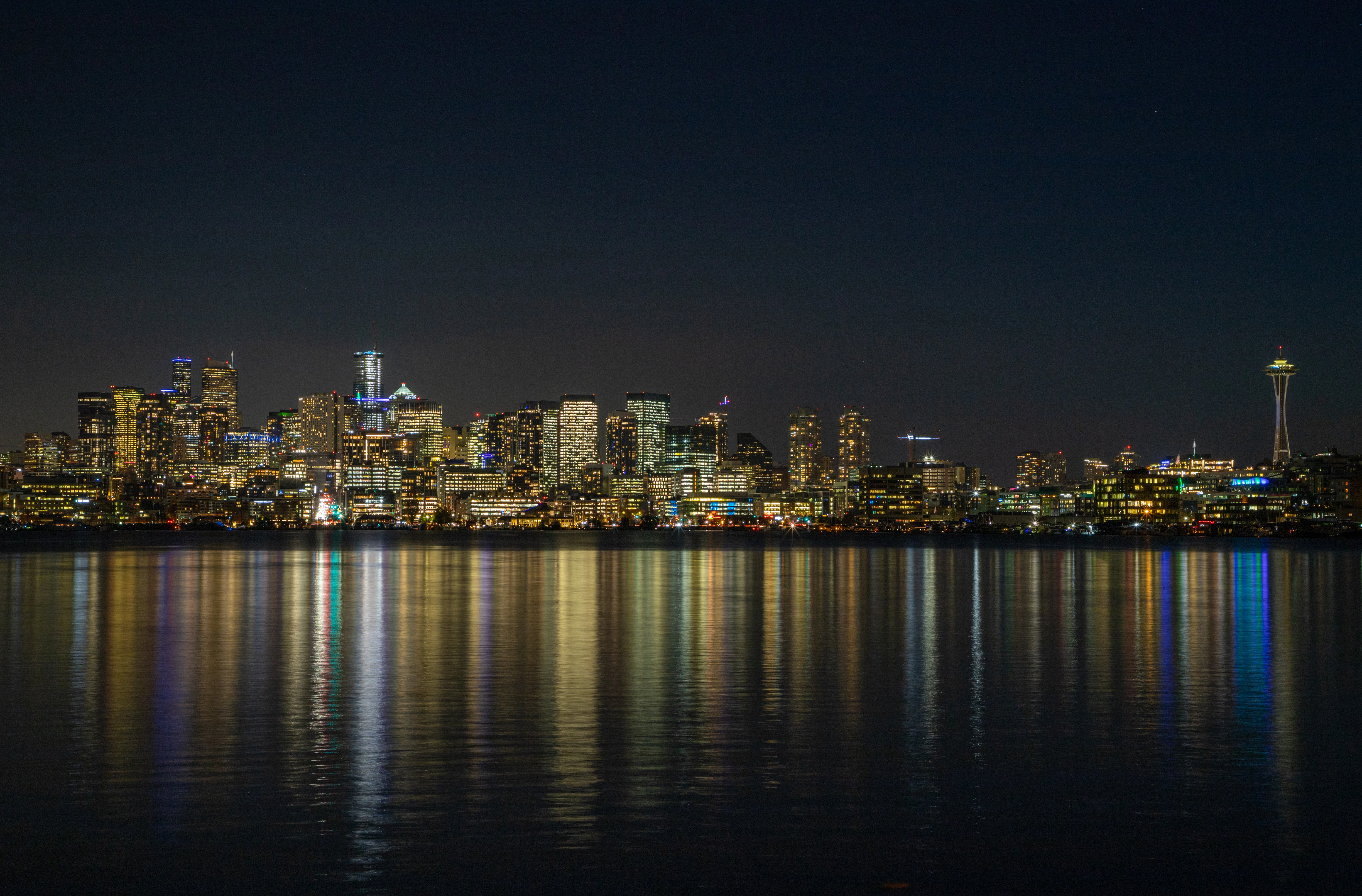 city skyline during night time